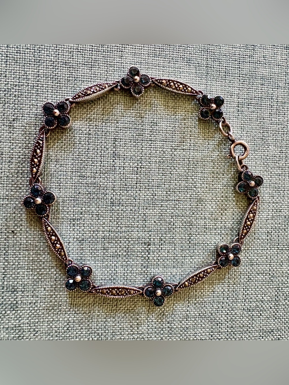 DBJ sterling bracelet featuring blue crystal flowers and marcasite